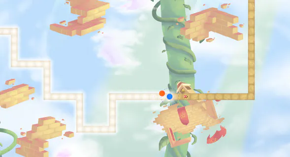 A Dance of Fire and Iceの赤と青の星が空中の折れ曲がった道を進む公式ゲーム画面